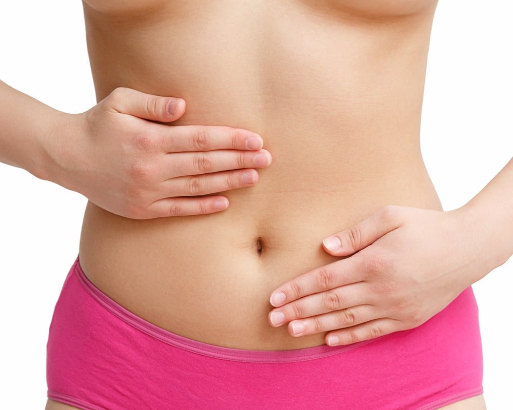 woman-massaging-pain-stomach-isolated-white-background1000800 【胃寒】你該怎麽用精油來養養你的胃？